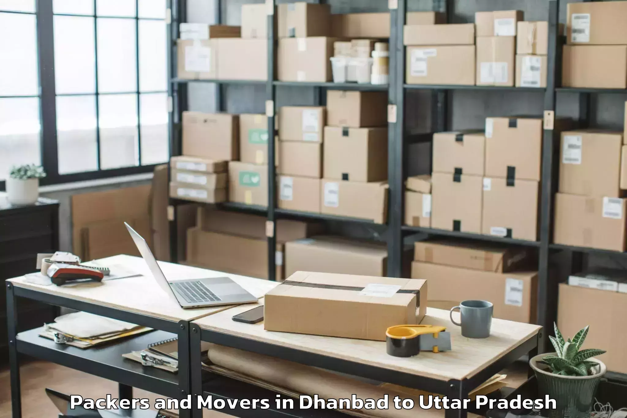 Affordable Dhanbad to Bajna Packers And Movers